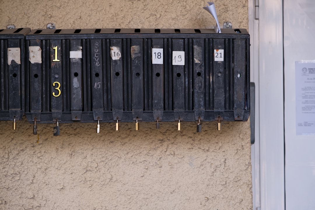 A bunch of electrical boxes hanging on a wall