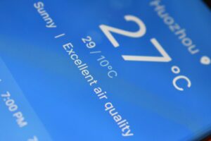 a close up of a cell phone with a blue background