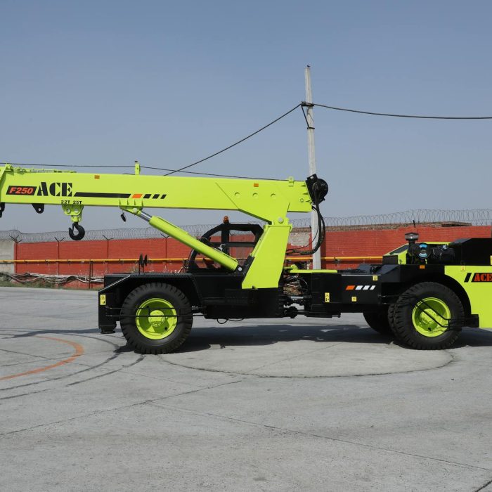 ACE F250 mobile crane in an outdoor industrial site, perfect for construction projects.